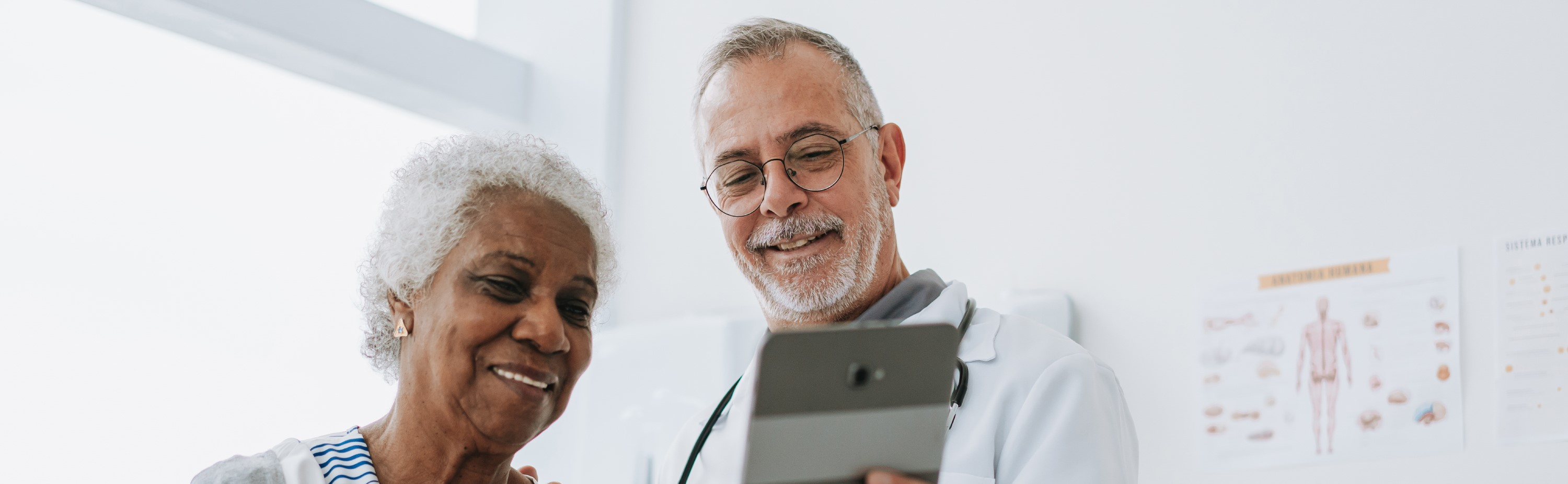 Doctor and patient review medical file