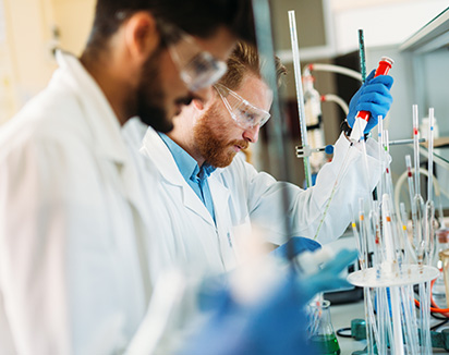 scientists at a lab bench