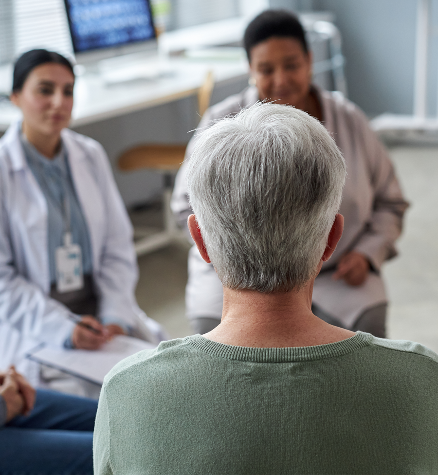 patient talking to group