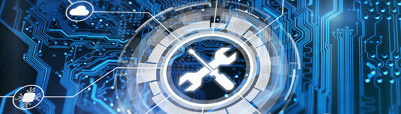 screwdriver and wrench icon superimposed over a circuit board