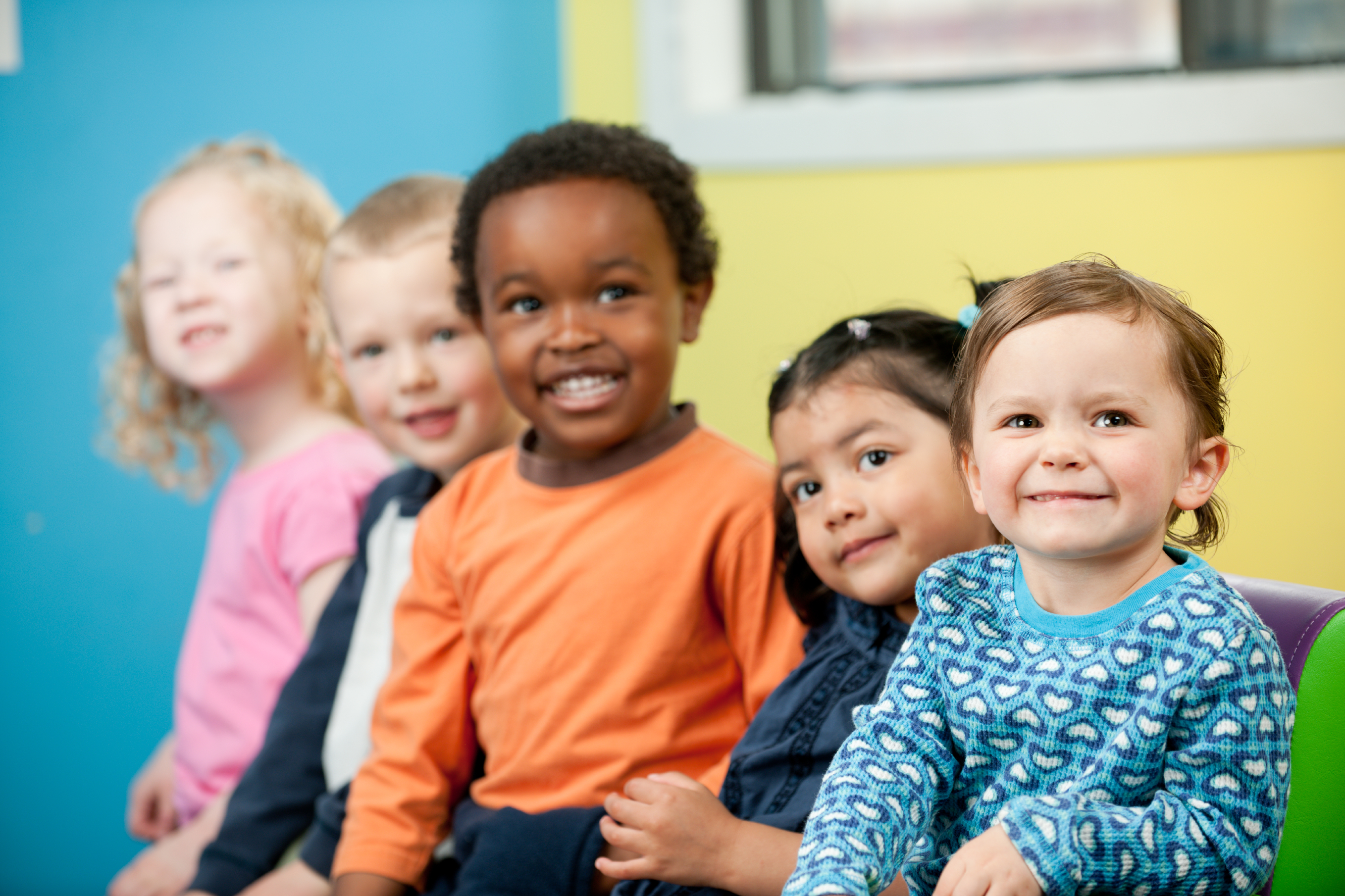A group of preschool children smiling