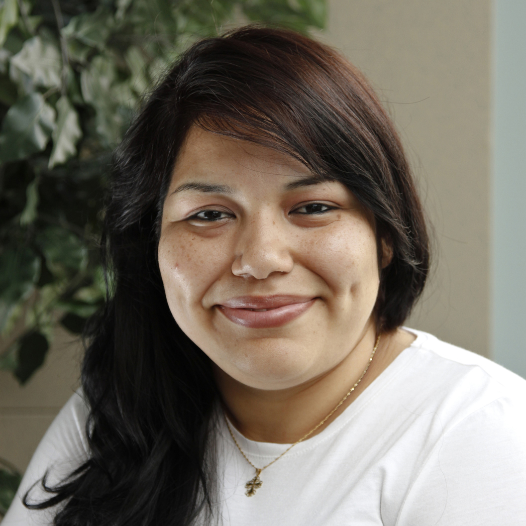 A young woman smiling for the camera