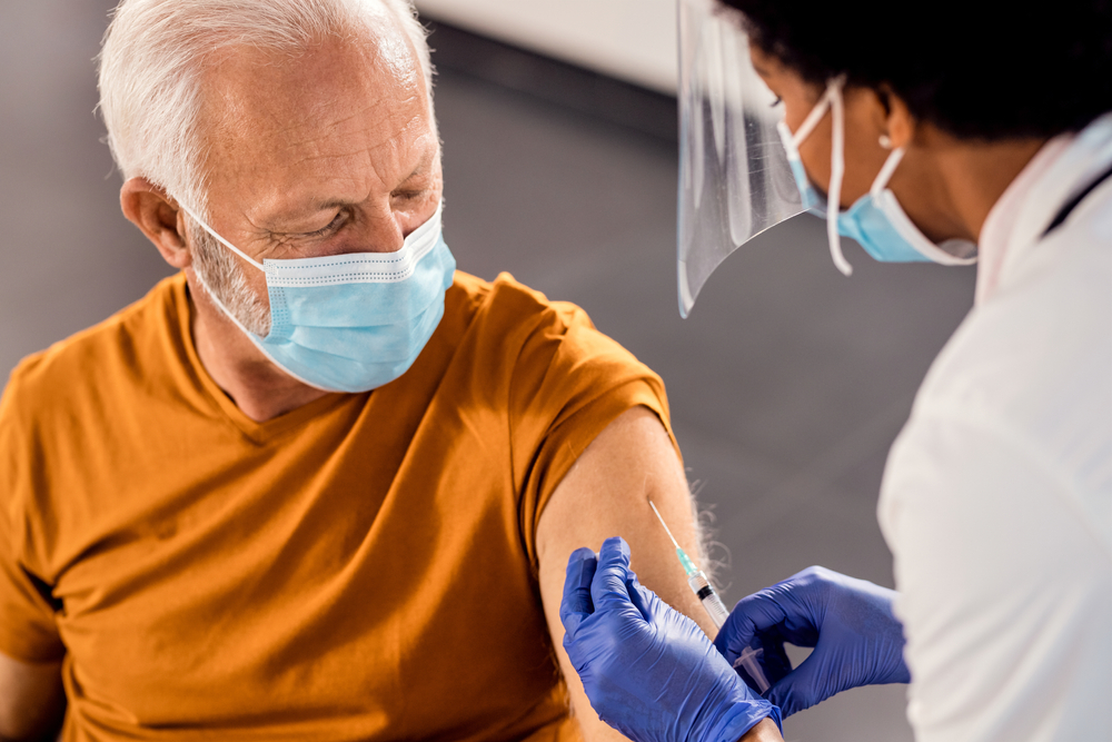 Man getting a vaccine.