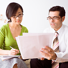 2_people_looking_at_the_same_report.jpg