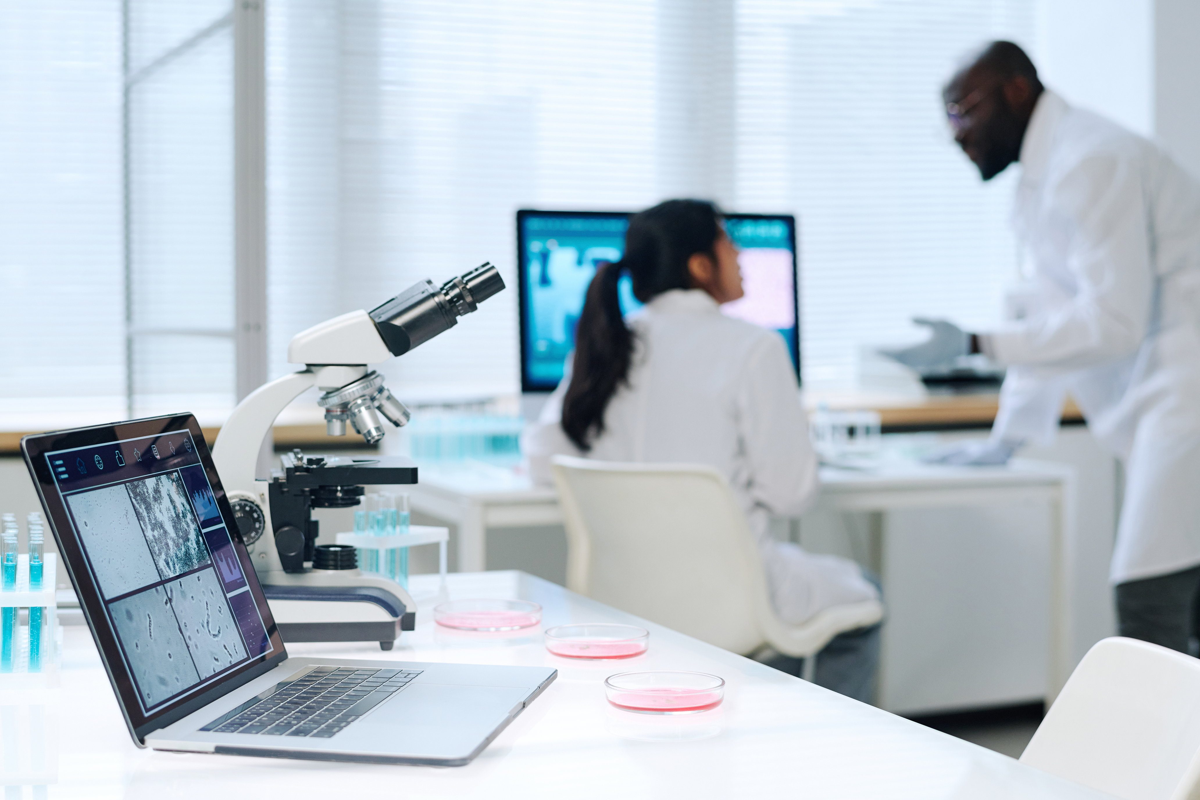 Scientists at computers, data science, iStock