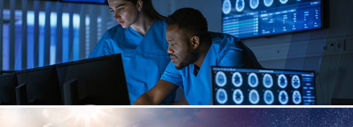 Decorative. Two young medical professionals looking at brain scans.