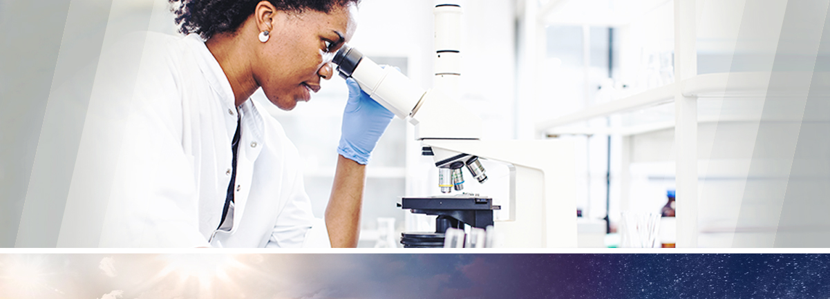 Decorative. African American medical professional looking at microscope