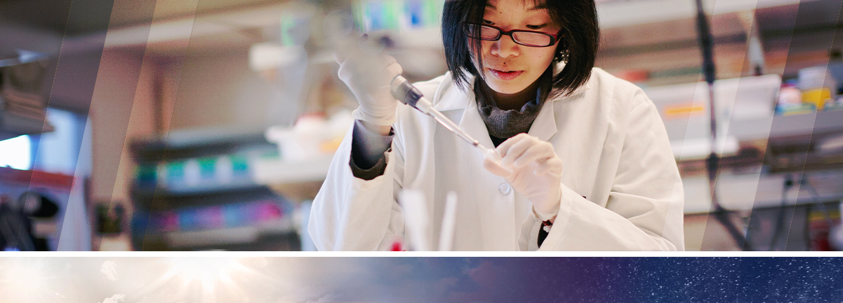 Decorative. Asian female scientist wearing a lab coat using a pipet