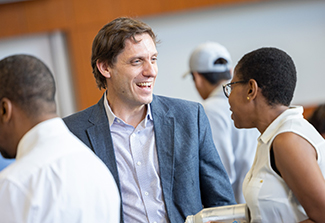 Scott Heysell laughing with a colleague