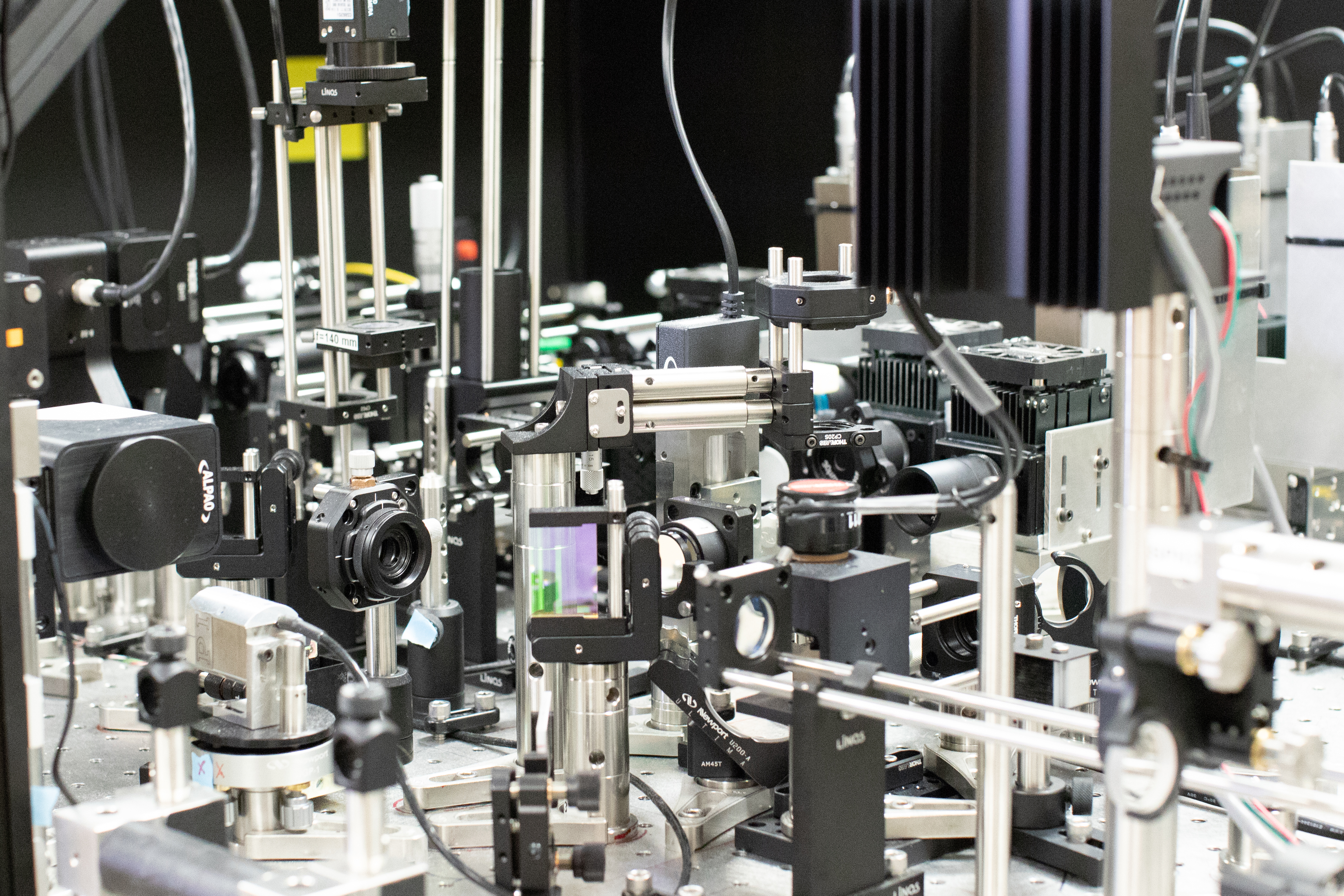 custom-built adaptive optics ophthalmoscope