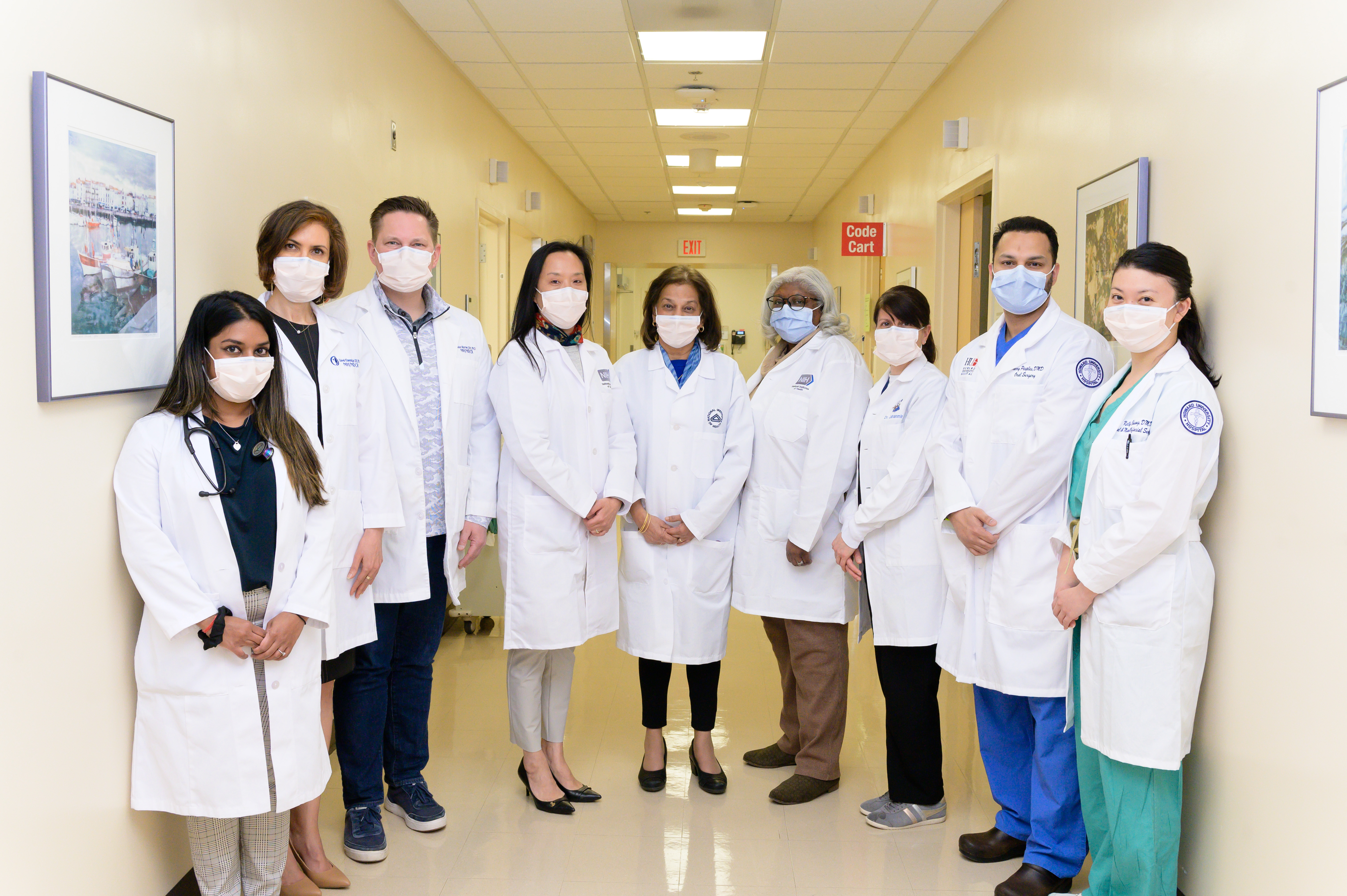 Dental clinic team with NIDCR Director Dr. Rena D'Souza