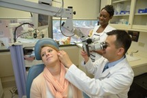 ear-doctor-examing-patient.jpg