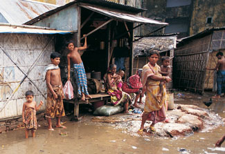 Family views flooding outside their home