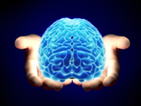 glowing blue brain held in hands.png