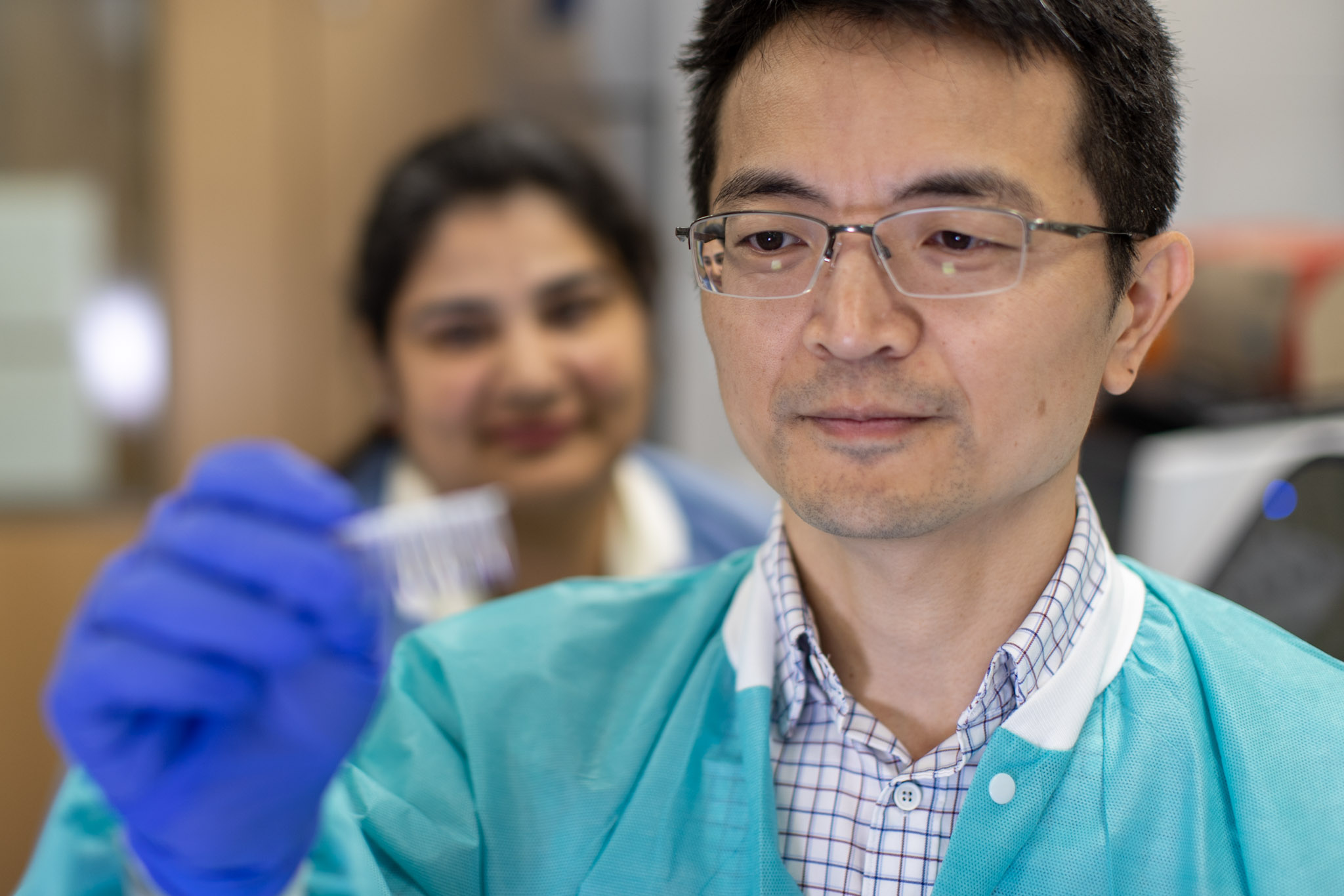 Scientists in NEI research labs