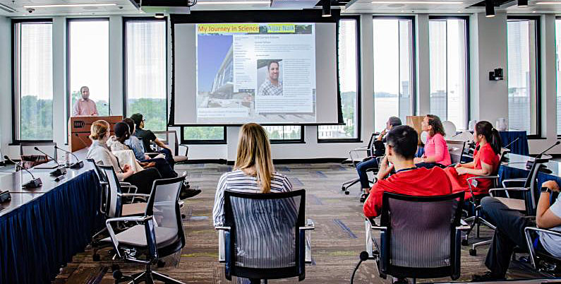 A presenter speaking at a CCB Seminar