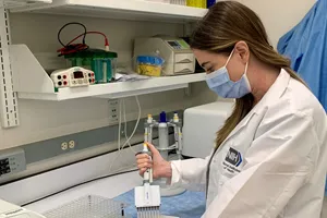 reseracher works in a lab