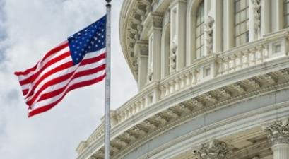 US Capitol building with American Flag