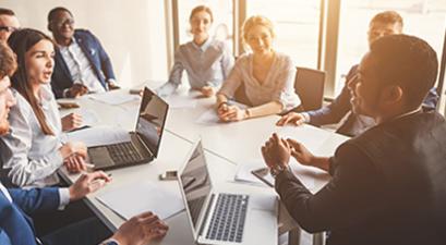 people around a conference table