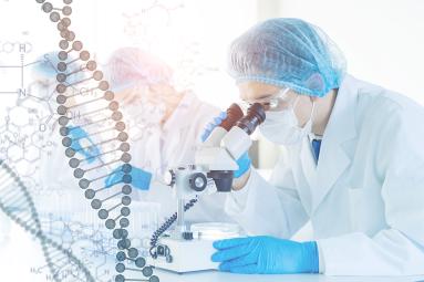 dna helix overlayed on a photo of a scientist in a lab