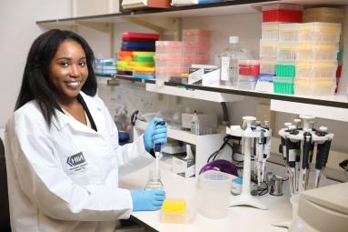 women scientist working at the bench