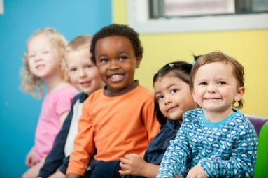 A group of preschool children smiling
